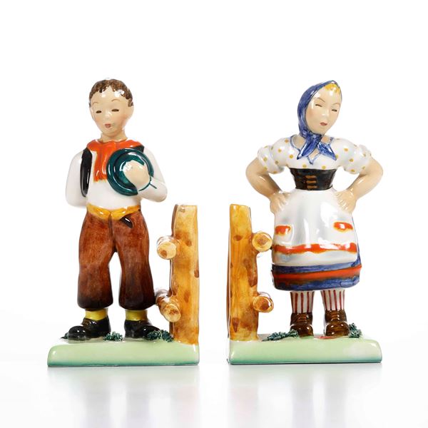 Una coppia di figurine e una coppia di reggilibri  Italia, prima metà de XX secolo