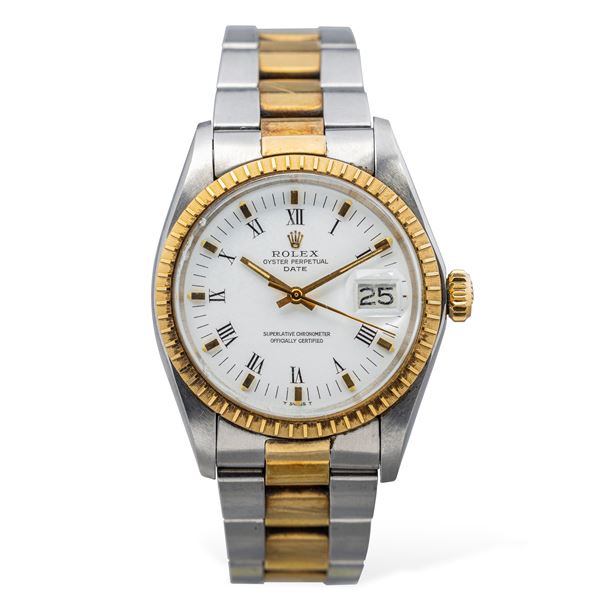 Rolex - Classic Oyster Perpetual ref 1505 steel and yellow gold automatic movement, white dial with applied indexes and Roman numerals, knurled crown and date window