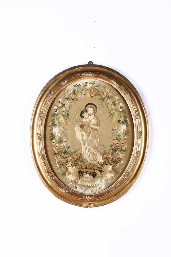 Ricamo ovale raffigurante Santo con Bambino. XIX secolo