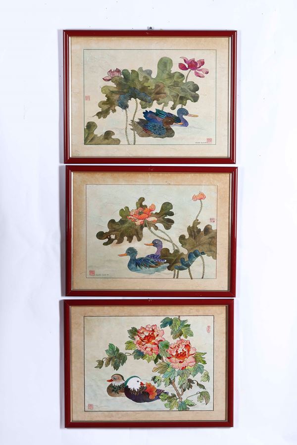 Lotto di tre stampe Giapponesi con uccelli e vegetazione. XX secolo