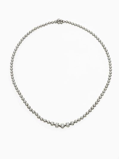 Rivière di diamanti, taglio brillante, in oro bianco 750/1000 (circa 5,70 ct)