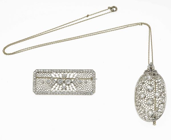 Two diamond and platinum brooches
