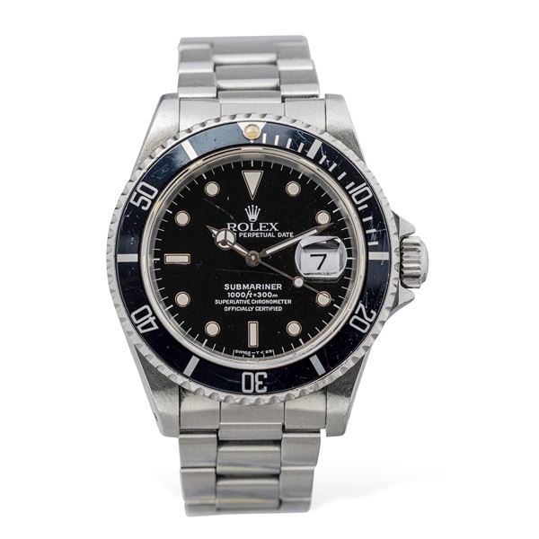 Rolex - Submariner 16610 with stainless steel case, oyster bracelet fliplock clasp accompanied by original box and guarantee