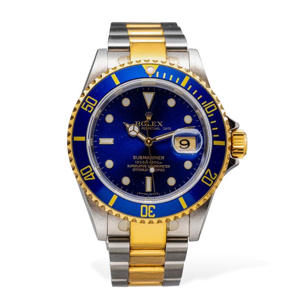Rolex - Submariner ref 16613 steel and gold, Blu Soleil automatic dial with date display, unidirectional revolving bezel, still present partial stickers also on the case back, box and warranty