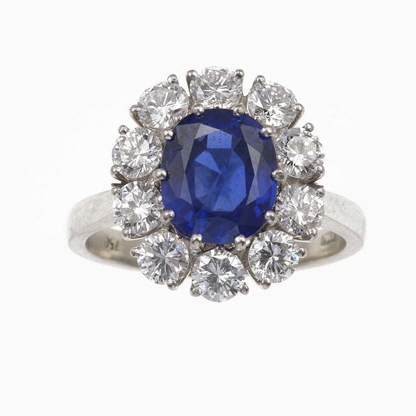 Burma sapphire and diamond cluster ring