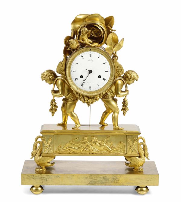 Pendola da tavolo in bronzo dorato e cesellato. Le Roy, Francia XIX secolo