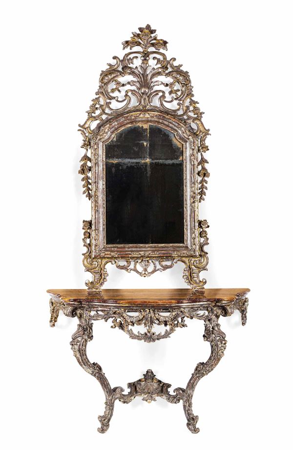 Consolle con specchiera in legno intagliato e argentato. Italia XVIII-XIX secolo