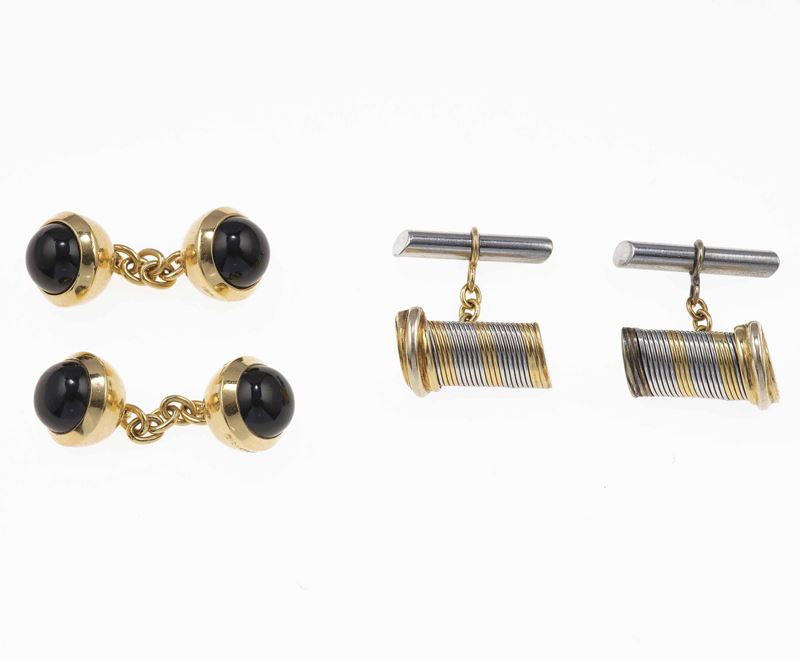 Two pairs of gold and onix cufflinks. Signed Cartier  - Auction Fine Jewels - Cambi Casa d'Aste