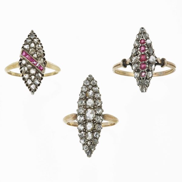 Tre anelli con diamanti di vecchio taglio e rubini sintetici