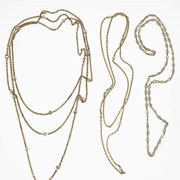 Three chains with pearls of different length