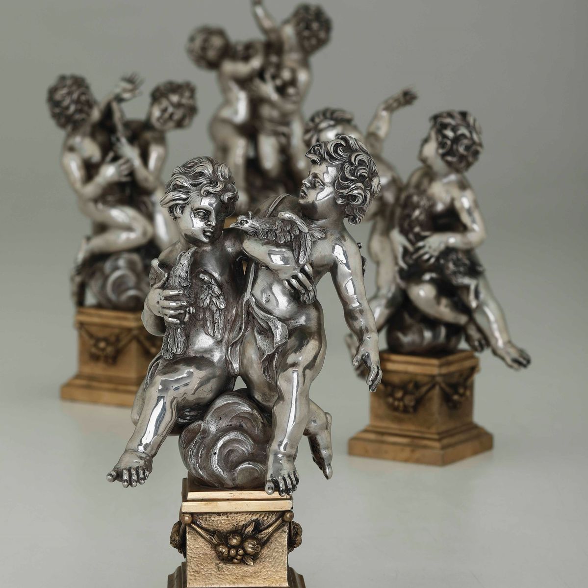 Quattro Gruppi Raffiguranti Giochi tra Putti. Argenteria Artistica Napoletana, Prima Metà del XX ...