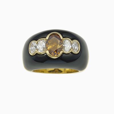 Anello a fascia in oro 750/1000 con diamante centrale fancy orangy brown irradiato (ct 1,48)
