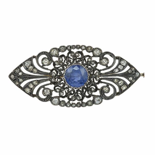 Sapphire, gold and silver brooch