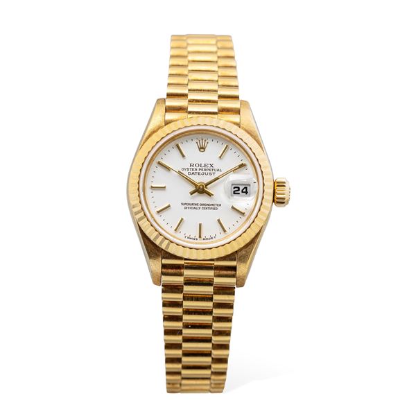 Rolex - Elegant and classic Lady Datejust ref 69178 in 18k yellow gold, knurled bezel, white dial with applied stick hour markers, sapphire crystal and President bracelet accompanied by box and warranty