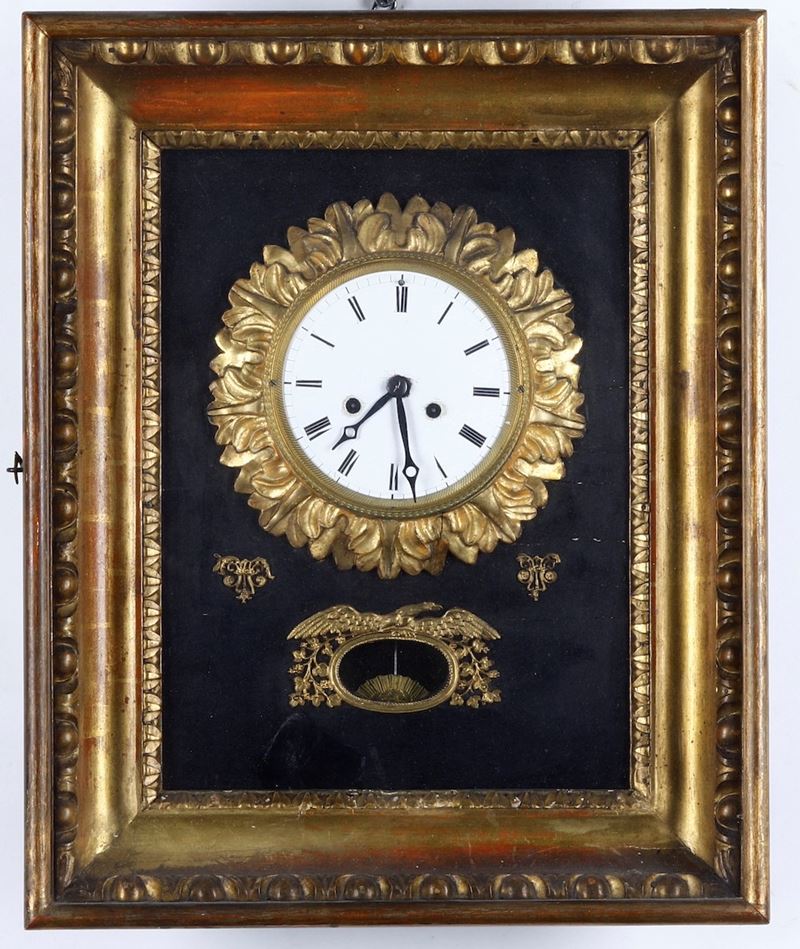 Orologio da parete in legno intagliato e dorato. Austria, XIX secolo - Asta  Pendole e orologi - Cambi Casa d'Aste