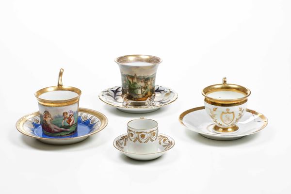 Quattro tazze e piattini. Diverse manifatture, XIX secolo.
