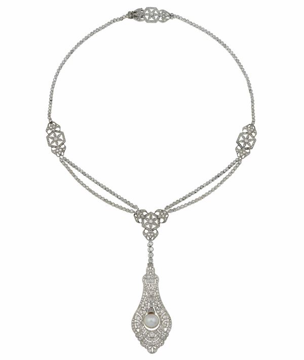 Natural pearl, diamond and platinum necklace. Signed and numbered Cartier Paris Londres 3744