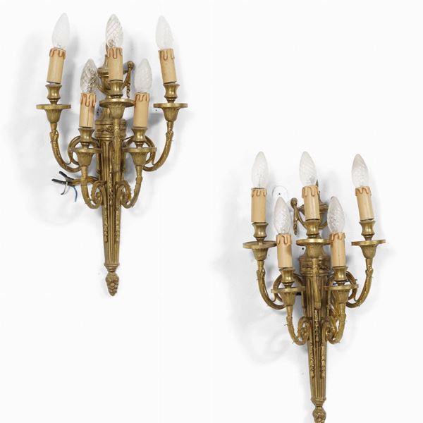 Coppia di appliques in bronzo dorato a 5 luci. XX secolo