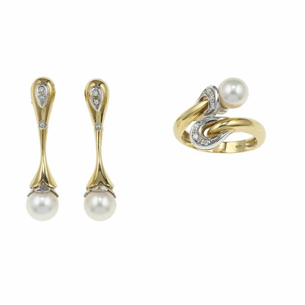 Demi-paure composta da orecchini ed anello con perle e diamanti