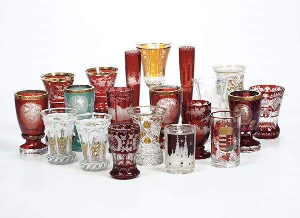 Venti bicchieri di cui una coppia con motivi erotici. Boemia, XIX e inizio XX secolo.