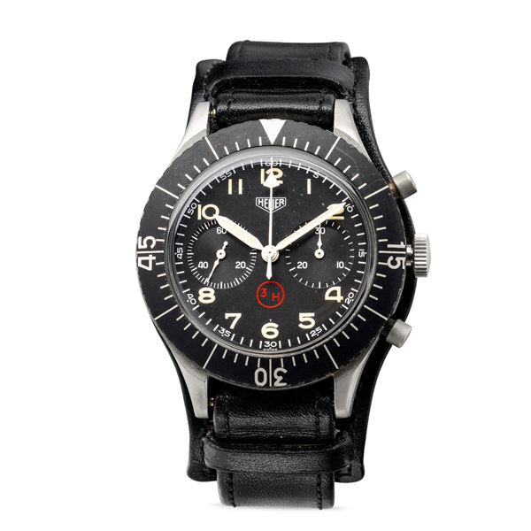 HEUER - Rare and impressive military chronograph Bundeswehr 3H with monobloc steel case, black dial with luminous hour markers and spheres, case back assigned for the German air forces