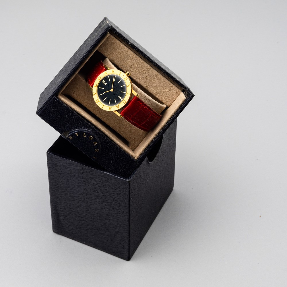 Fine ed Elegante, Bulgari, Orologio da Polso Lady in Oro Giallo, Quadrante Nero e Movimento al Qu...