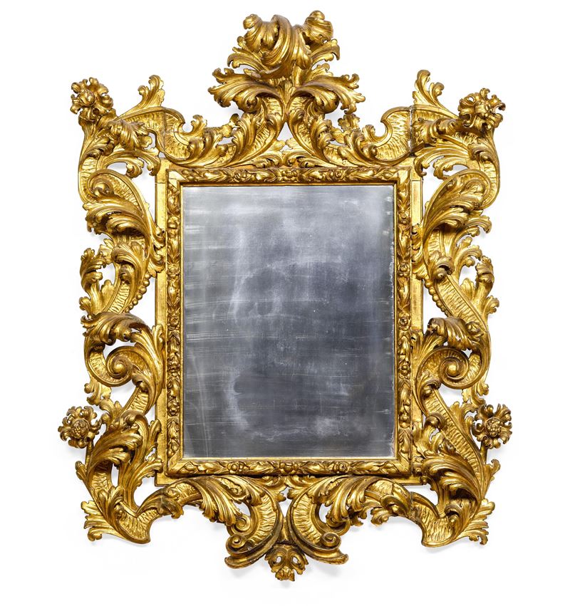 Specchiera barocca in legno riccamente intagliato e dorato. Centro Italia XVII-XVIII secolo  - Asta Dimore Italiane - Cambi Casa d'Aste
