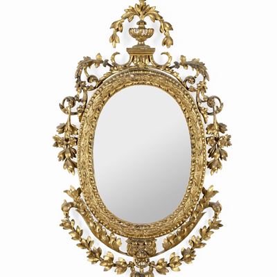 Specchiera Ovale in Legno Riccamente Intagliato e Dorato. Fine XVIII Secolo