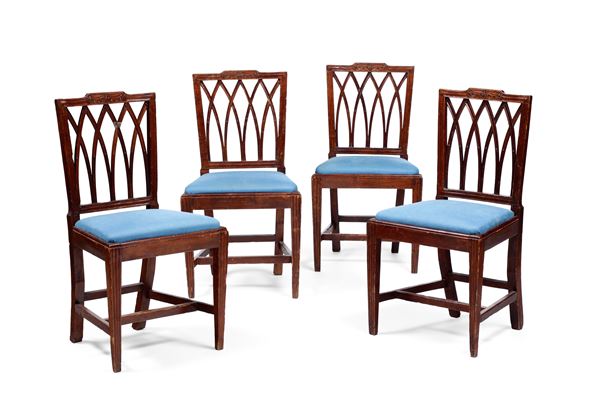 Quattro sedie in legno intagliato. XIX secolo