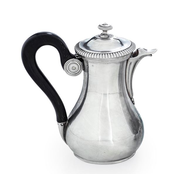 A coffee pot and pitcher