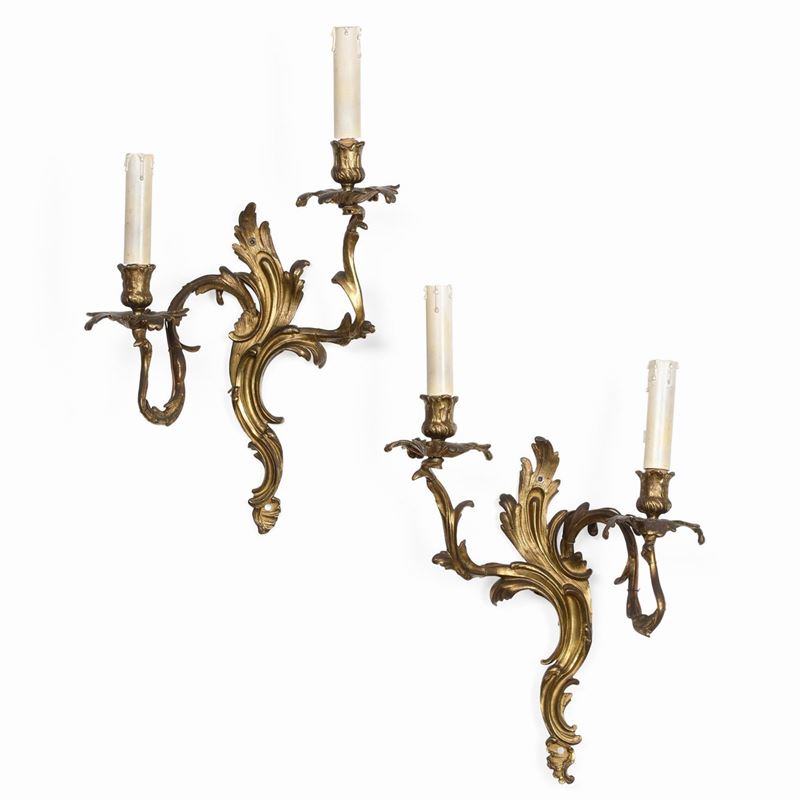 Coppia di appliques a due luci in bronzo dorato. XIX-XX secolo  - Auction Italian Mansions - Cambi Casa d'Aste