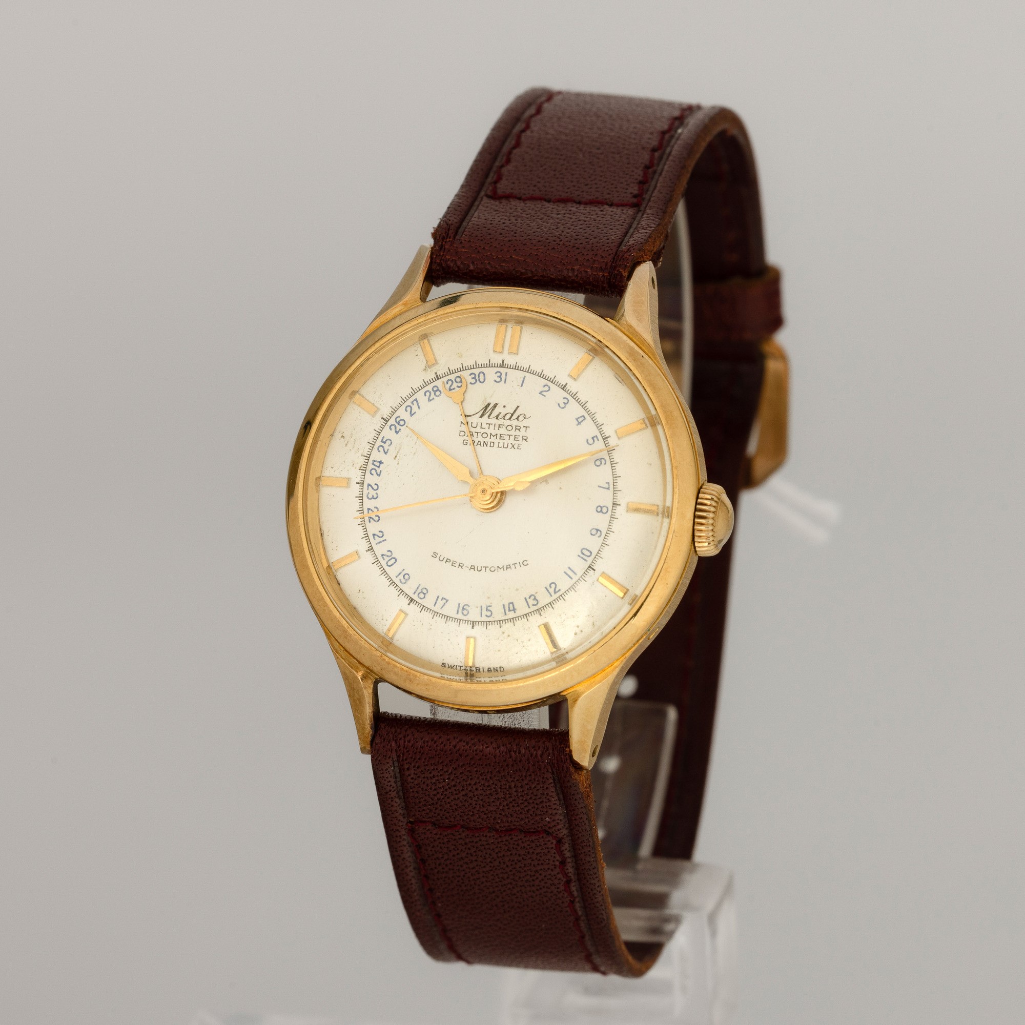 Mido - Super Automatic in Oro Giallo 18k con Datario, Quadrante Argentè e Lancette Gladio, 34 MM