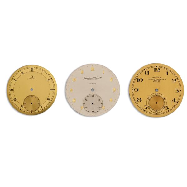 Lotto di tre quadranti:<BR>International Watch argentè, 42,5 mm<BR>Vacheron & Constantin salmone, 42,5 mm<BR>Omega chamapagne, 39,5 mm