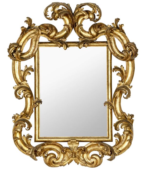 Specchiera in legno intagliato e dorato. XVII-XVIII secolo