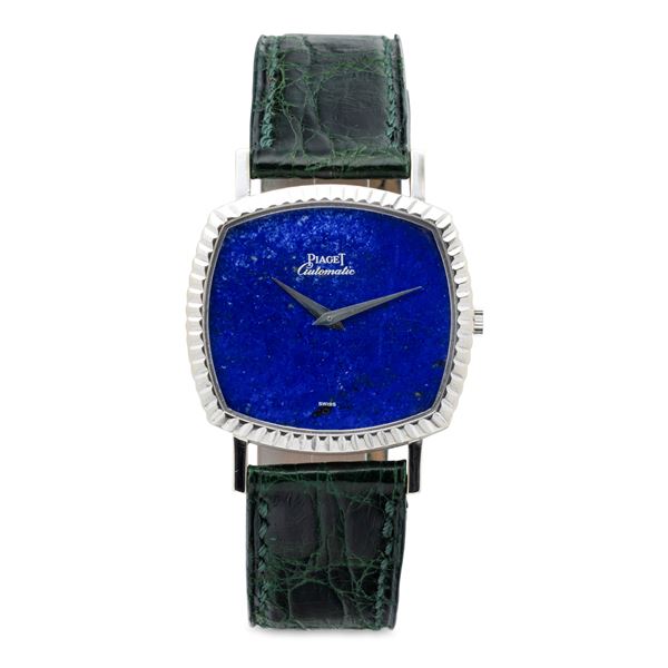 Fine and elegant automatic pillow shaped watch with Lapis Lazuli stone dial, bezel and knurled yokes