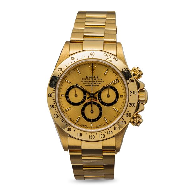 Rolex - Iconic and valuable Cosmograph Daytona ref 16528 in 18k yellow gold with champagne dial and contrast black subdials