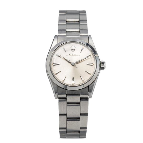 Rolex - Precious Oyster Perpetual Watch ref 6548 in steel with Silver dial and applied indexes, Oyster bracelet, complete with original box and warranty