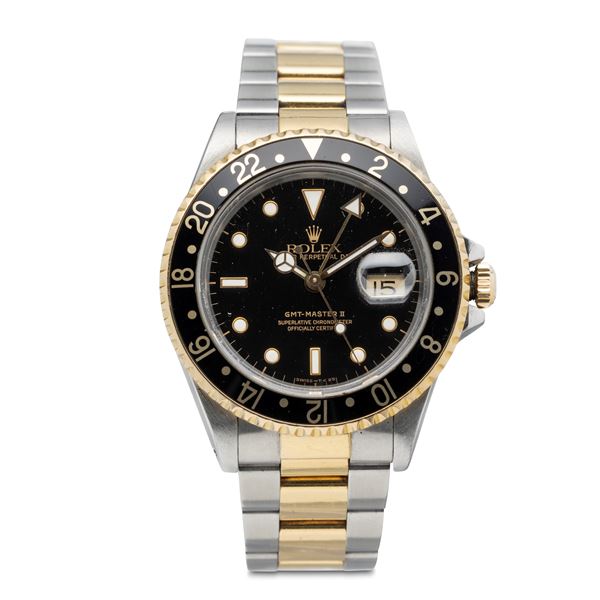 Rolex - Sporty GMT Master II ref 16713 steel and gold black dial, double time zone, Oyster bracelet