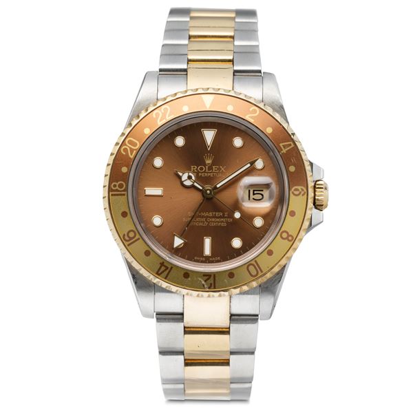 Intriguing GMT Master II ref 16713 "Tiger Eye" in steel and gold with two-tone rotating bezel, double  [..]