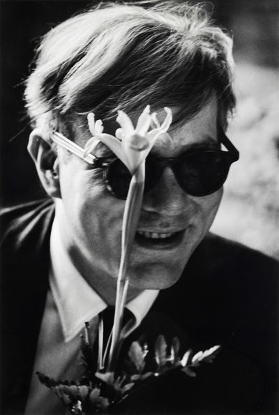 Andy Warhol (with Flower, Smiling)
