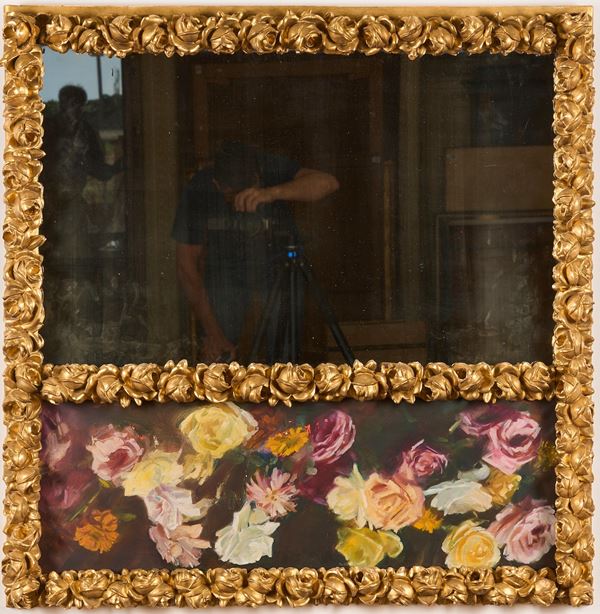 Specchio con cornice in legno scolpito e dorato. XIX-XX secolo