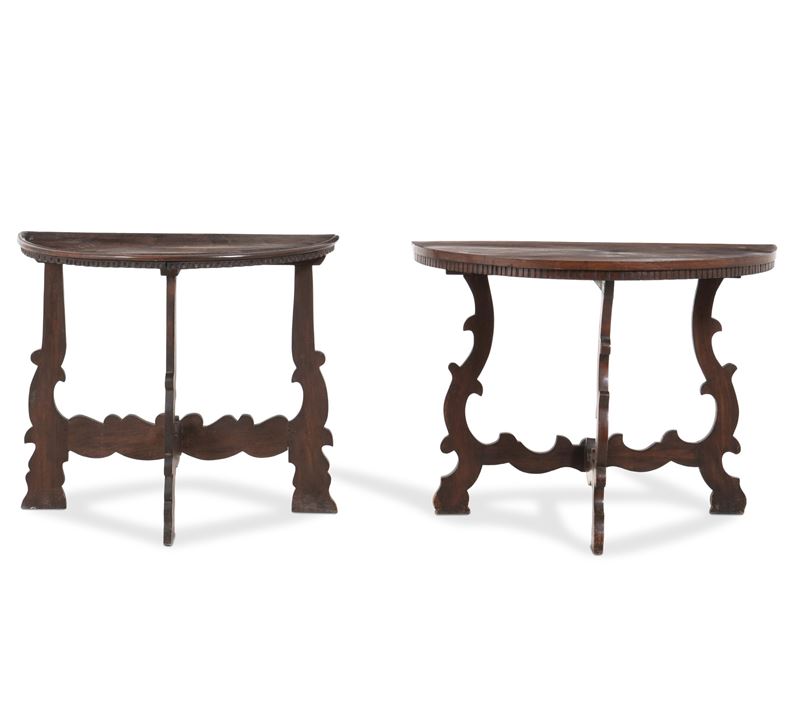 Due mezzi tavoli in legno intagliato. XX secolo  - Auction Antique - Cambi Casa d'Aste