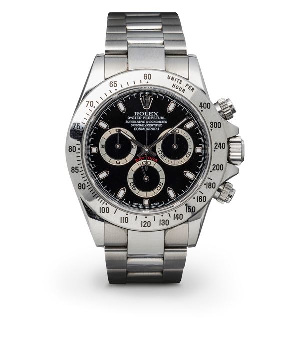 Rolex - Daytona ref 116520, fine and attractive wristwatch with luminous black dial and chronograph with three subdials, stainless steel with bracelet, warranty and original box