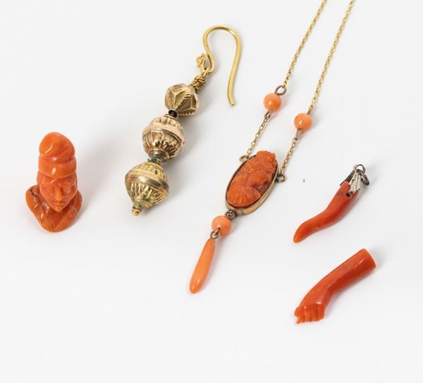Five corals and gold objects