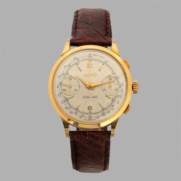 Extra-fort in oro giallo 18k con tasti rettangolari, quadrante Argentè con numeri arabi e indici applicati, carica manuale, 40 mm<BR>