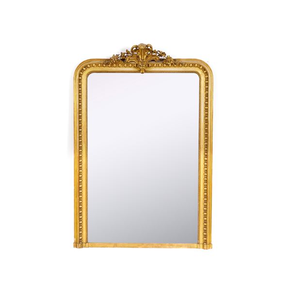 Grande specchiera dorata in legno e pastiglia. XIX-XX secolo