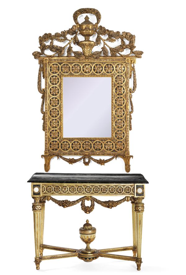 Consolle con specchiera in legno intagliato, laccato e dorato. Ebanisteria neoclassica italiana del  [..]