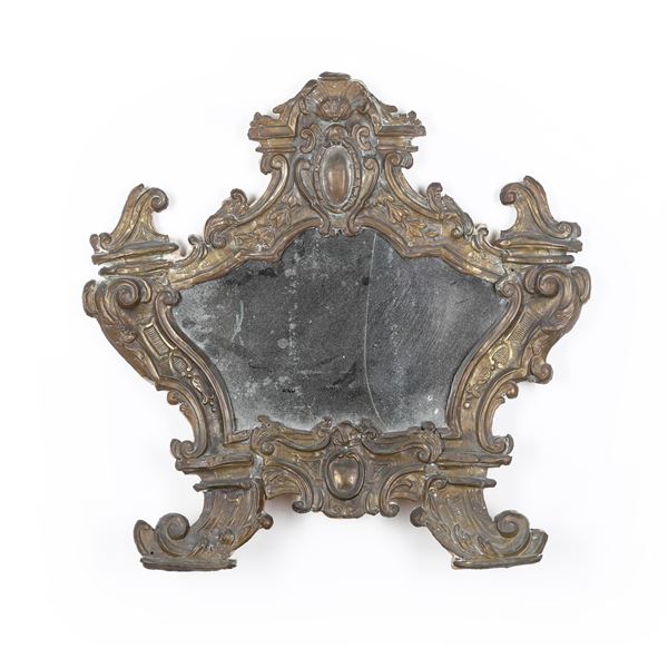 Grande cartagloria in ottone sbalzato. XIX secolo