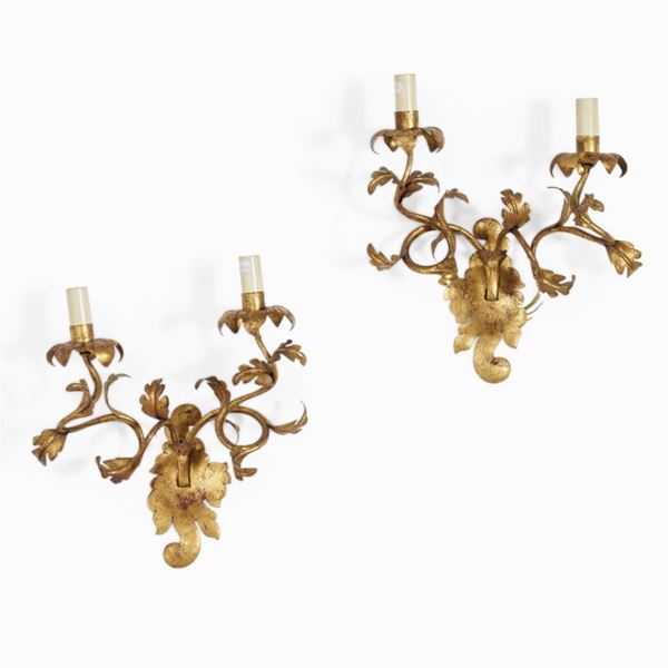 Coppia di appliques in metallo dorato