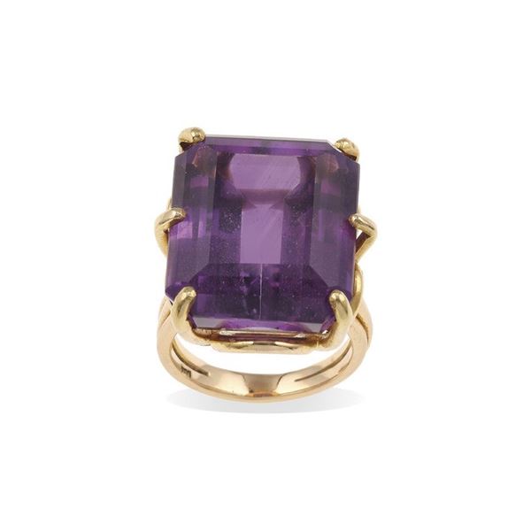 Purple gem and gold ring